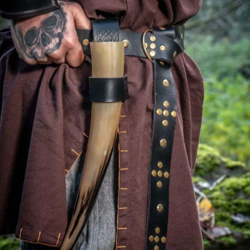 Black Renaissance leather belt with gold rivets, ring closure, and attached drinking horn.