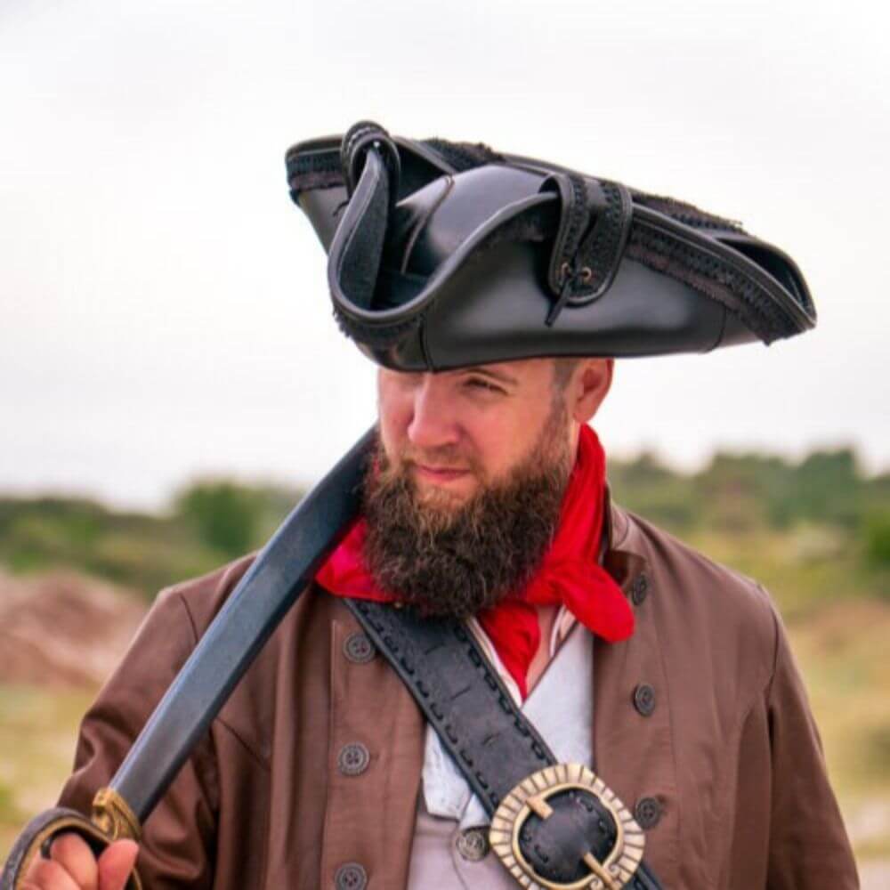 Black faux leather tricorn pirate hat with canvas trim, perfect for Renaissance events.