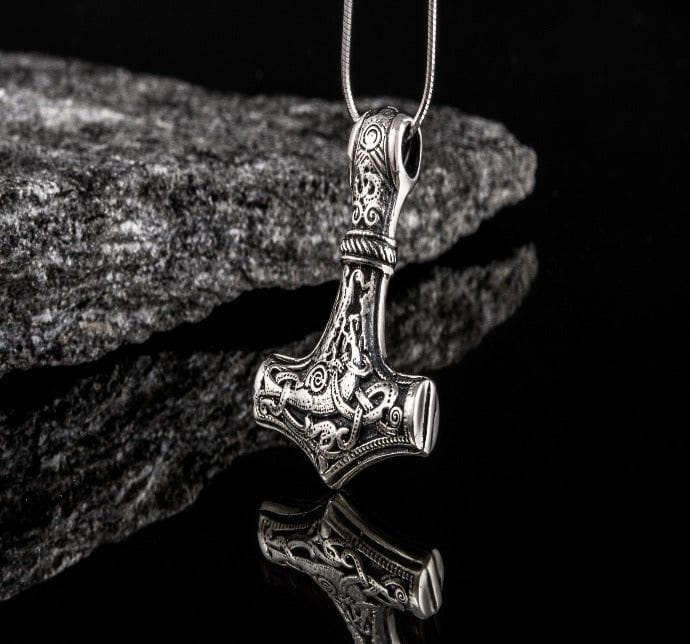Sterling silver Renaissance hammer pendant, 30x22mm, with intricate double-sided decorative design on a chain.