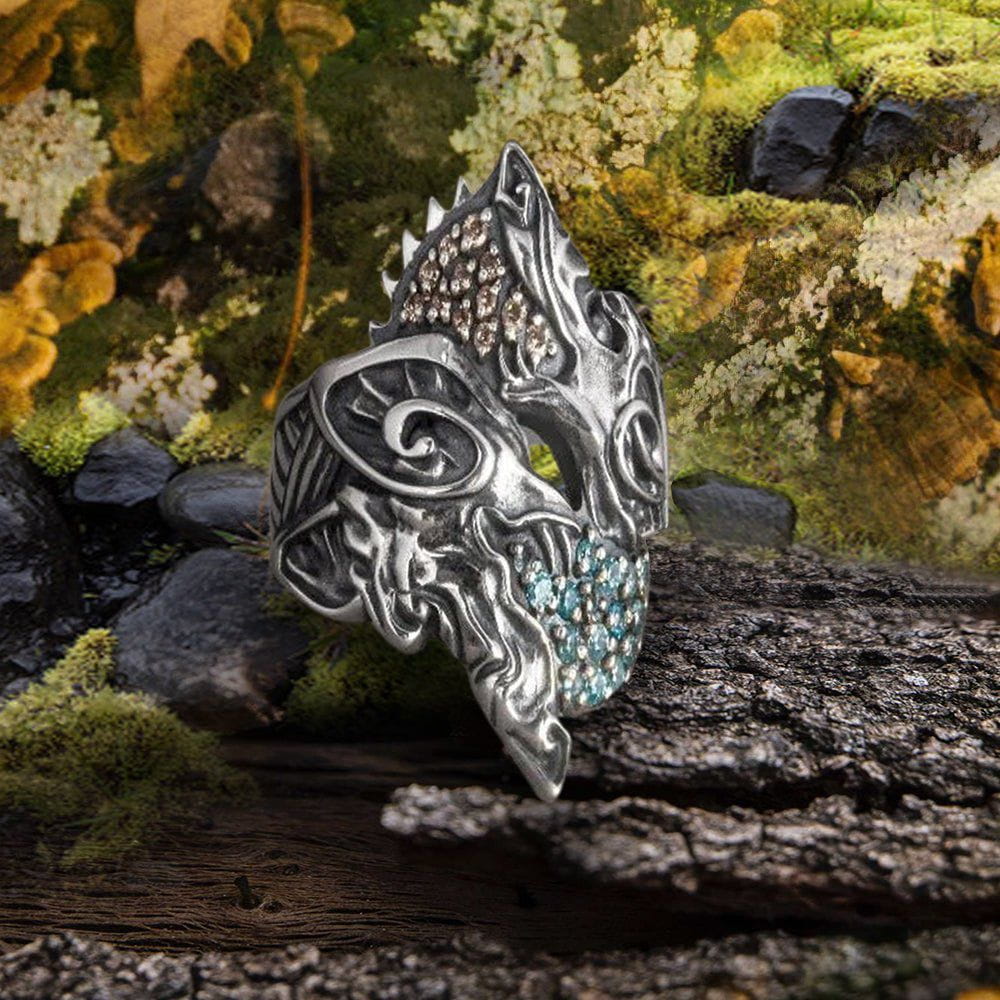 Renaissance sterling silver Hati and Skoll wolf ring with detailed design and blue/clear gemstones.