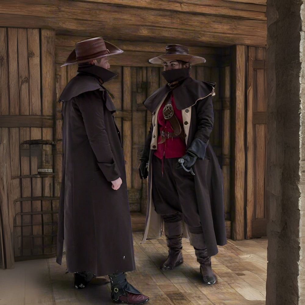 Two people in brown canvas Renaissance pirate overcoats with hats and mantles.