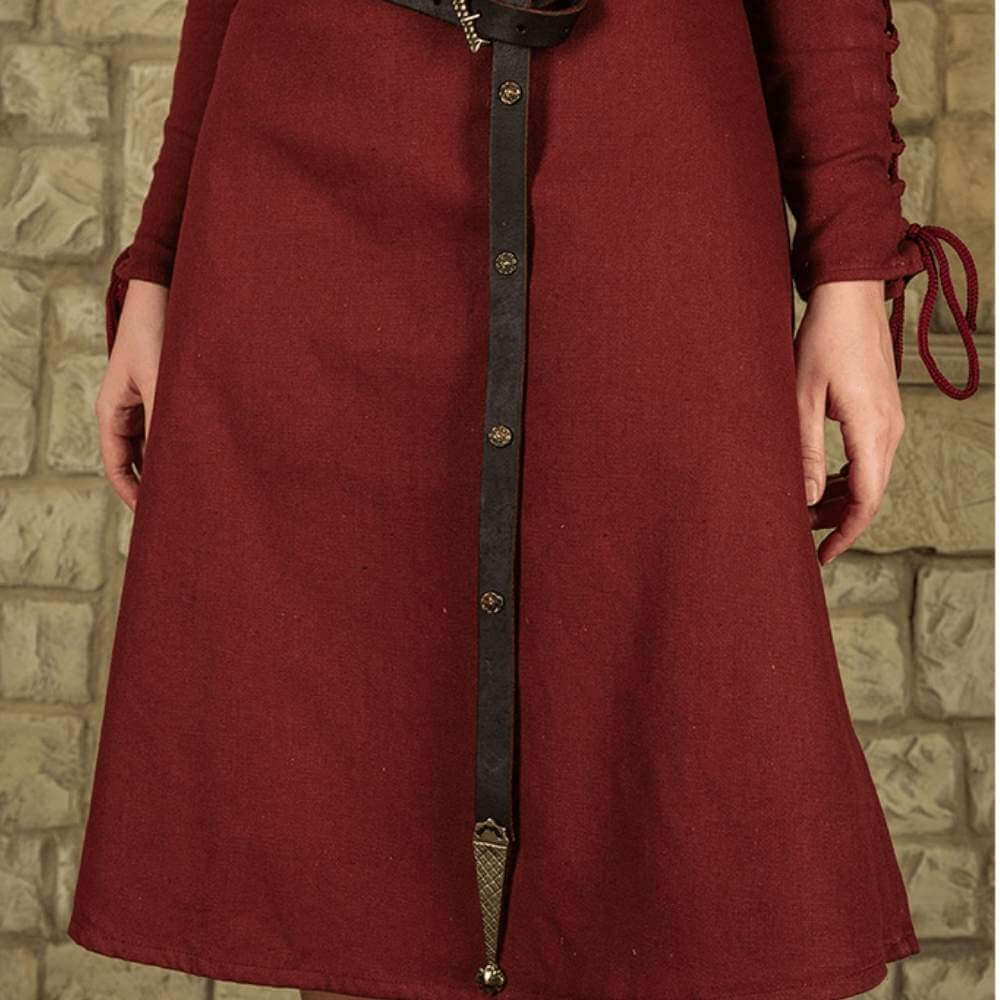 Dark brown Renaissance leather belt with rose-shaped brass accents over a red dress.