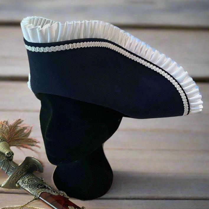 Black naval tricorn hat with white ruffled frill and trim, perfect for Renaissance costumes.