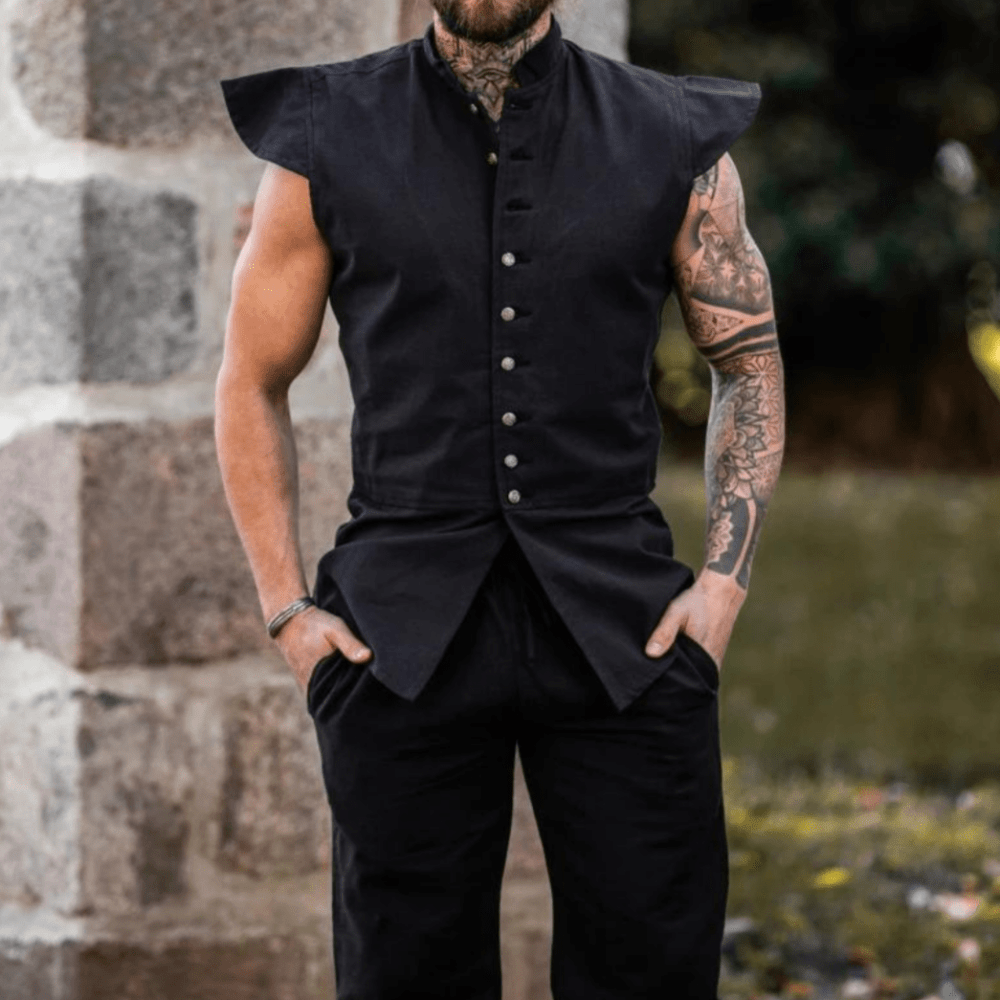 Renaissance black sleeveless cotton doublet with ornate metal buttons, worn by a man.