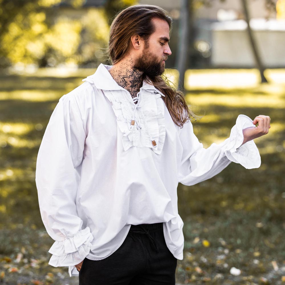 White cotton Renaissance shirt with ruffled neckline, cuffs, and lace-up front on a man.