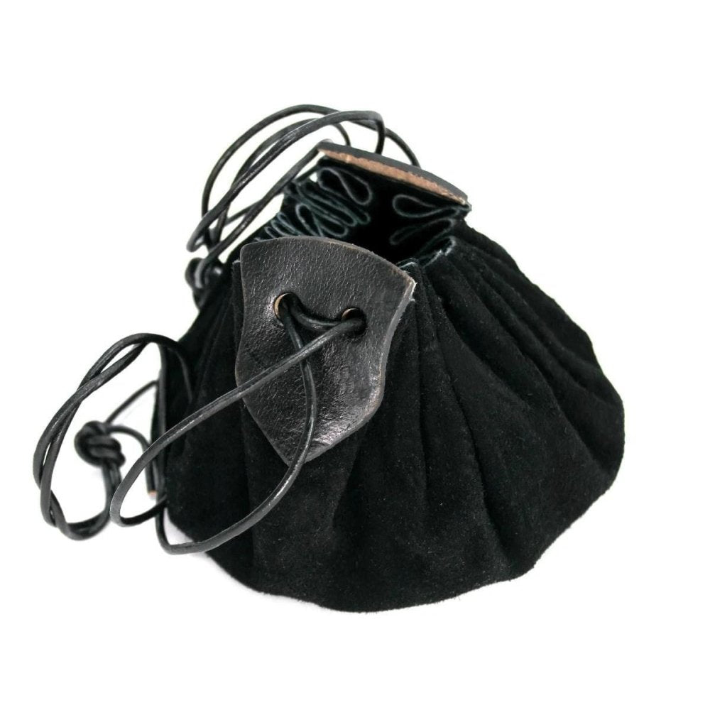 Close-up of black genuine suede pouch with drawstring cord