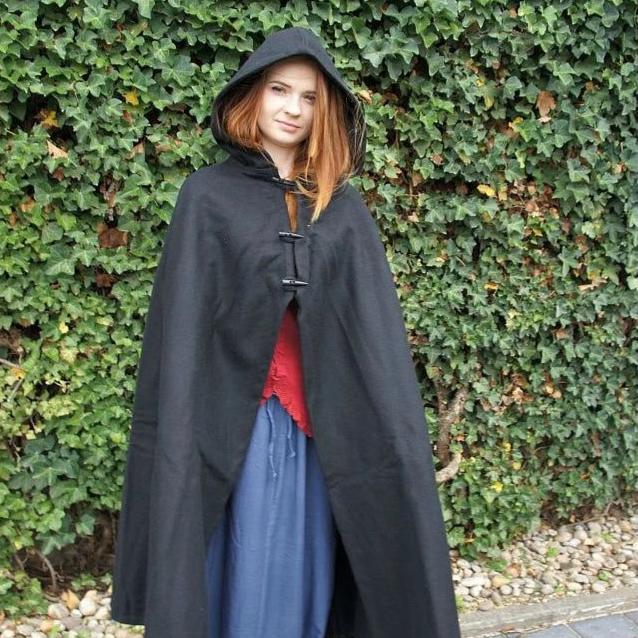Hooded wool cloak worn over a Renaissance outfit