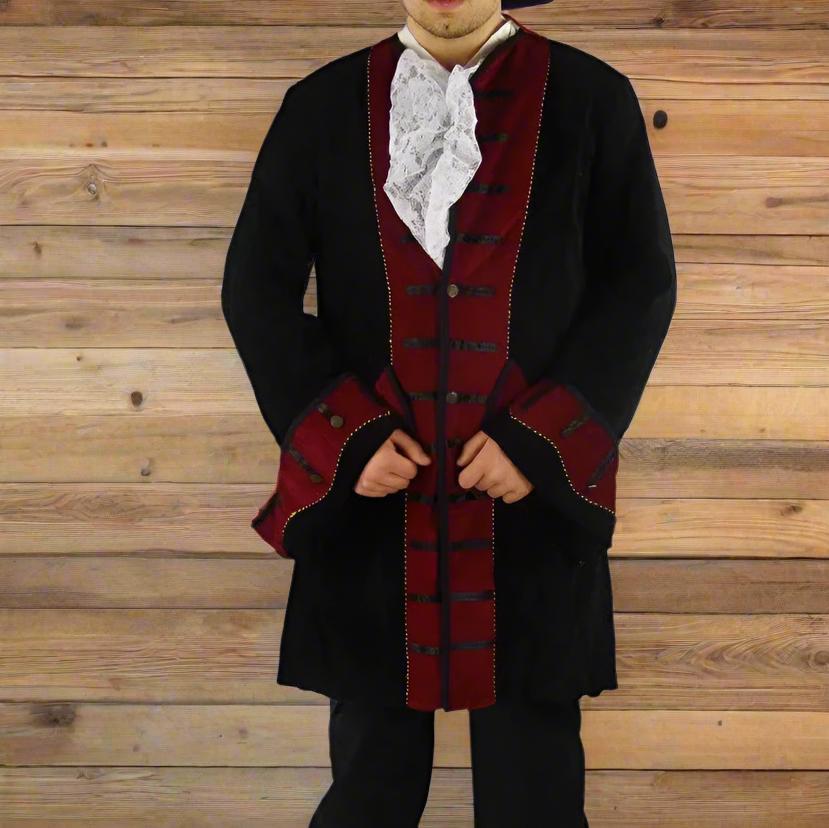 Black Renaissance velvet frock coat with red trim, metal buttons, and wide rolled sleeves.