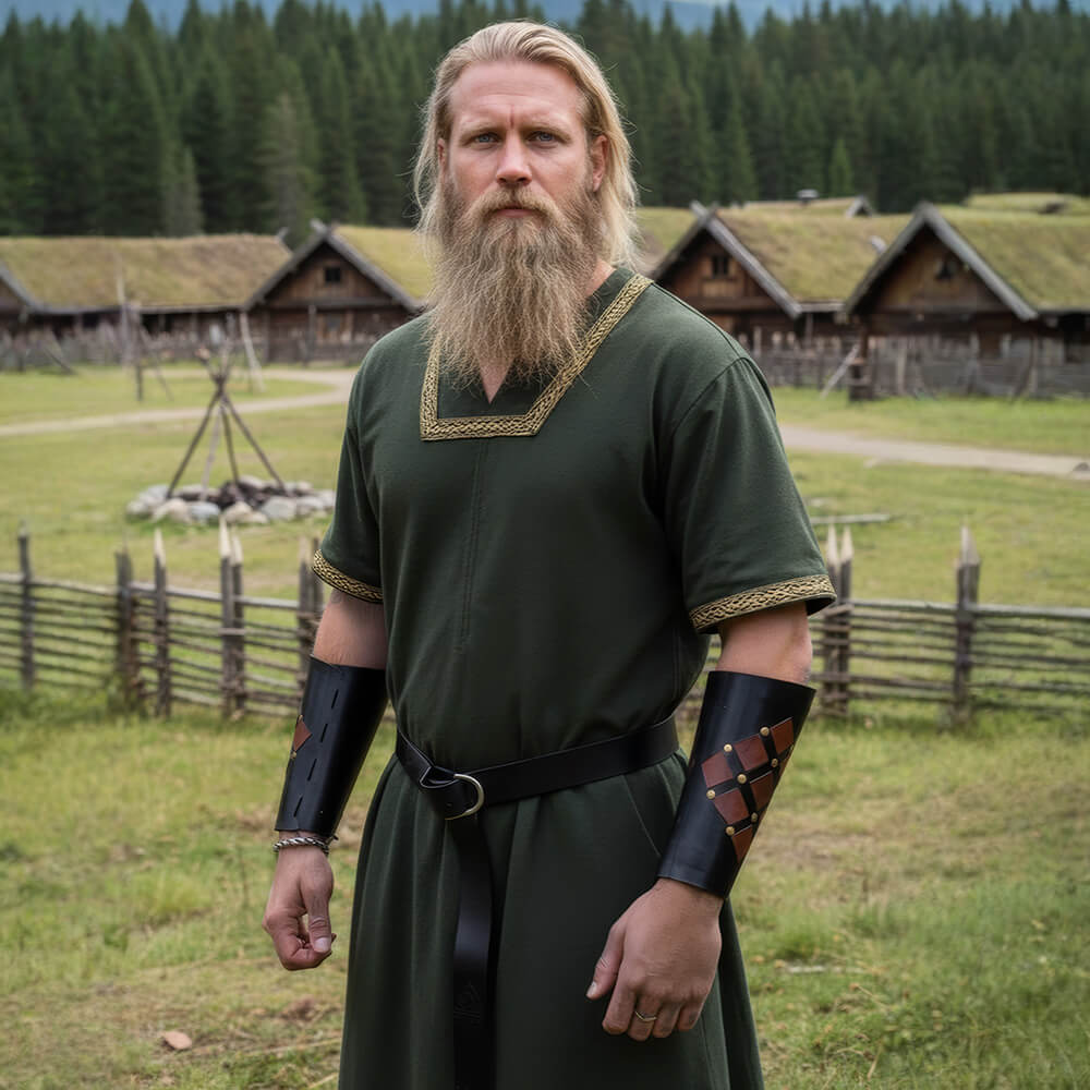 Renaissance green cotton tunic with gold trim, short sleeves, and a black belt on a bearded man.