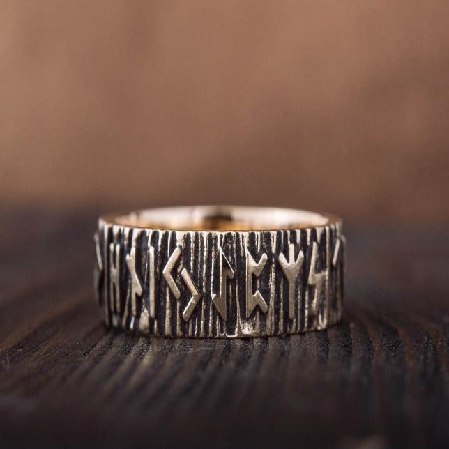 Bronze ring with Elder Futhark runes carved around the band