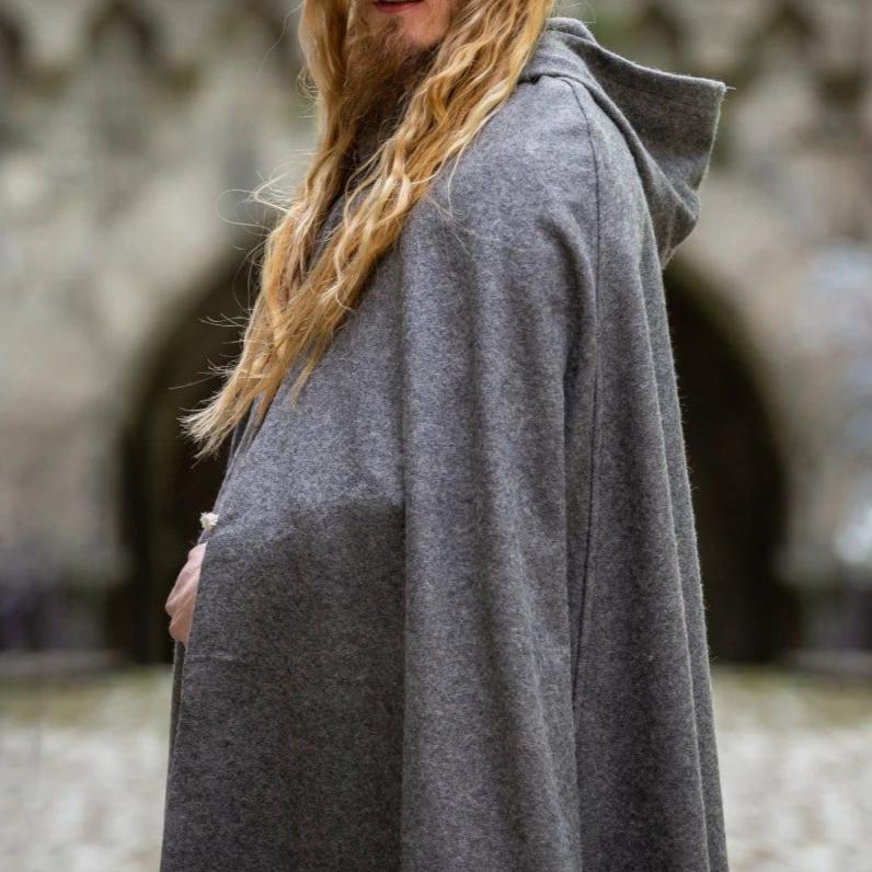 Back view of hooded wool cloak showing full length